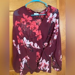 Gorgeous deep red flowered blouse. Classy!